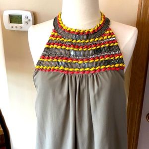 Elegant press brand sleeveless blouse. Cactus color, front beaded neck detail! L